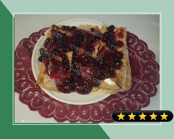 Ricotta Cheese Blintzes with Berry Topping recipe